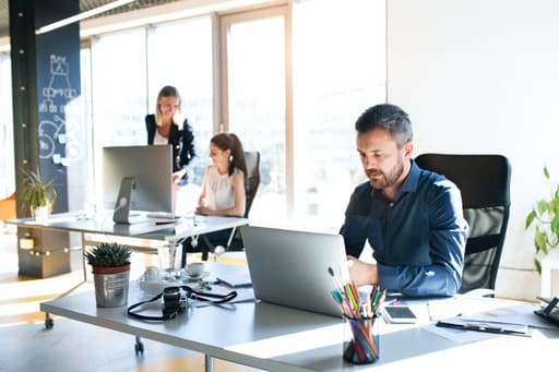 office with man on computer-updated